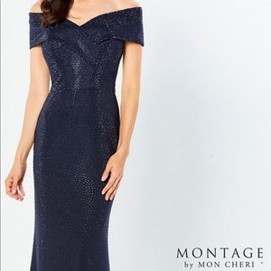 Navy gown with crystals size 14. With tags on.